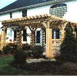 wood pergola with square lattice vine trellis by elyria fence